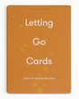 vitruta Letting Go Cards, duygusal iyileşme ve geçmişi bırakma üzerine 52 adet rehberlik kartı içeren turuncu kutu.